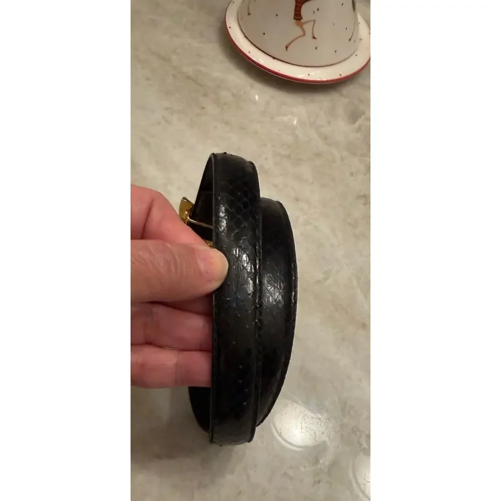 Vintage Dame black eelskin belt gold clip sz S